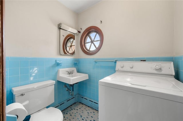 21 Top St, Westerly, RI 02891 - bathroom featuring tile patterned flooring, washer / dryer, wainscoting, and toilet