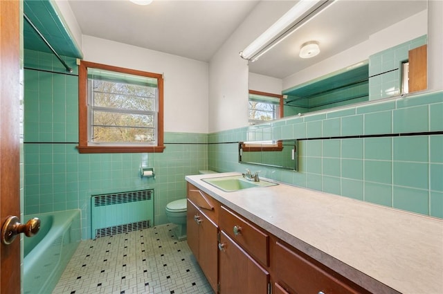 21 Top St, Westerly, RI 02891 - full bath featuring a bathtub, a wainscoted wall, vanity, toilet, and radiator