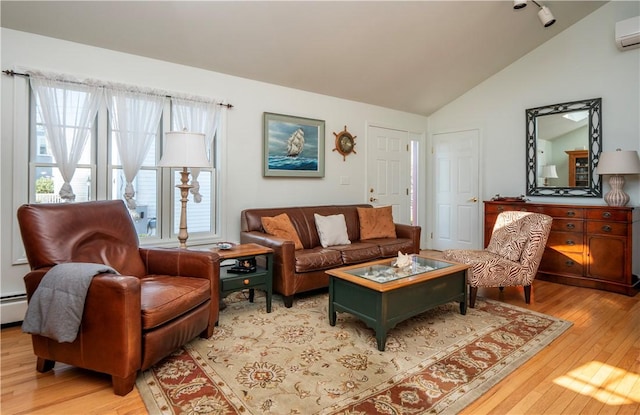 living area featuring lofted ceiling, light wood-style floors, an AC wall unit, and a baseboard heating unit