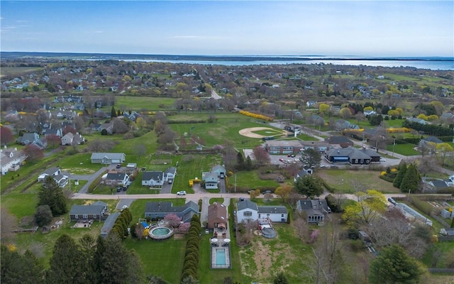 aerial view featuring a water view and a residential view