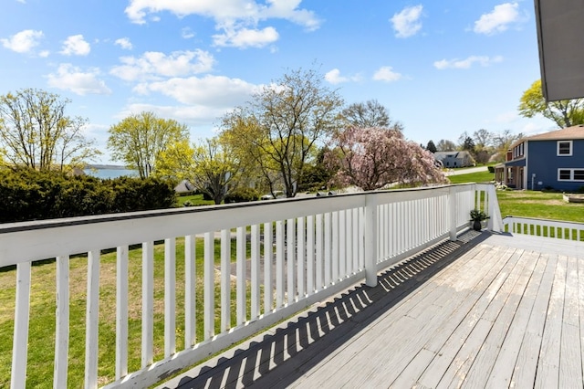 deck featuring a lawn