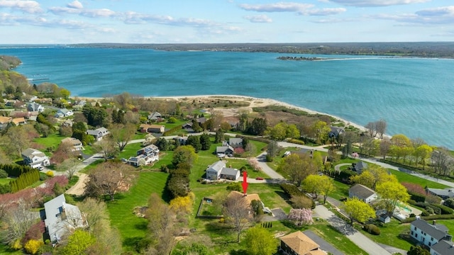aerial view featuring a water view and a residential view