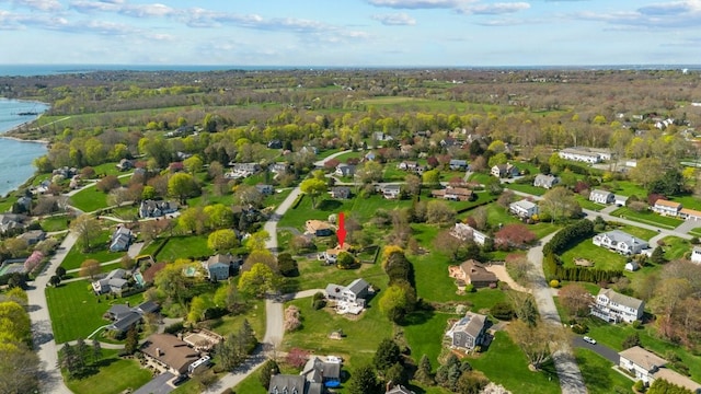 bird's eye view with a water view and a residential view