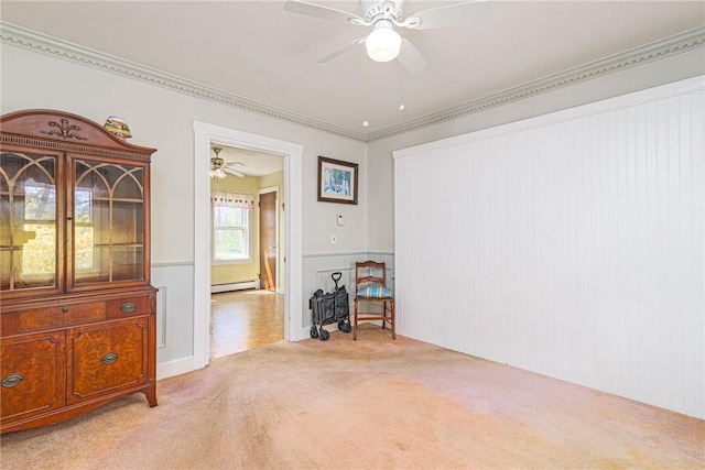 141 Canal St, Westerly, RI 02891 - unfurnished room featuring ornamental molding, ceiling fan, light colored carpet, and a baseboard heating unit