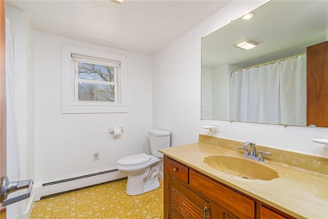 141 Canal St, Westerly, RI 02891 - bathroom featuring visible vents, a baseboard heating unit, toilet, and vanity