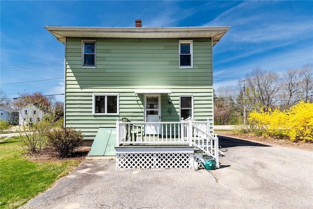 141 Canal St, Westerly, RI 02891 - back of house featuring a chimney