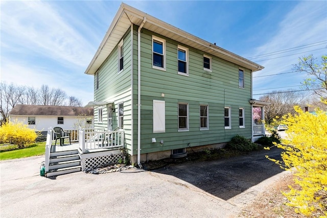141 Canal St, Westerly, RI 02891 - view of side of home featuring a wooden deck
