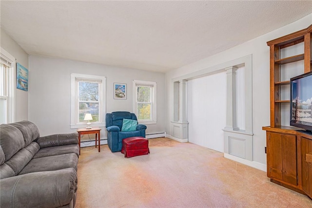 141 Canal St, Westerly, RI 02891 - living room with decorative columns, light carpet, and a baseboard radiator