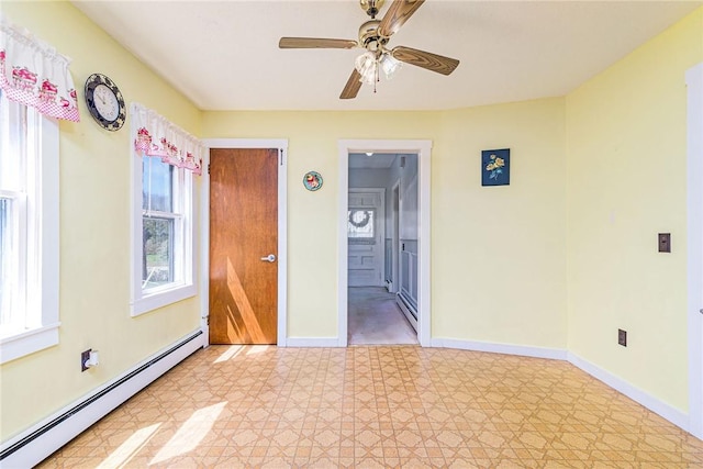 141 Canal St, Westerly, RI 02891 - unfurnished room featuring light floors, ceiling fan, baseboards, and a baseboard radiator