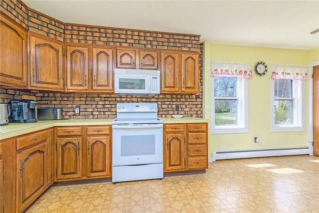 141 Canal St, Westerly, RI 02891 - kitchen with a baseboard heating unit, light countertops, brown cabinets, and white appliances