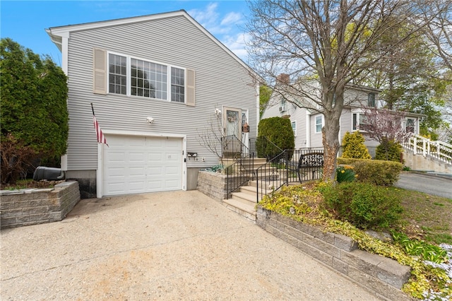 43 Royal Ave, Cranston, RI 02920 - view of property exterior featuring driveway and an attached garage