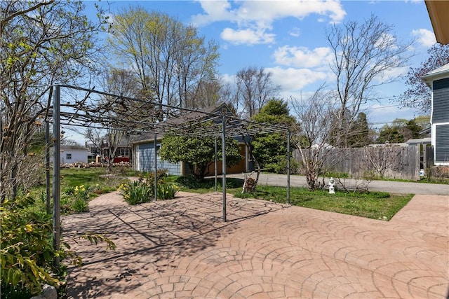 exterior space featuring a patio and fence