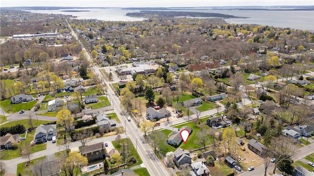 aerial view with a residential view and a water view