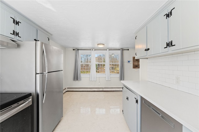 kitchen featuring a baseboard heating unit, under cabinet range hood, backsplash, light countertops, and stainless steel dishwasher
