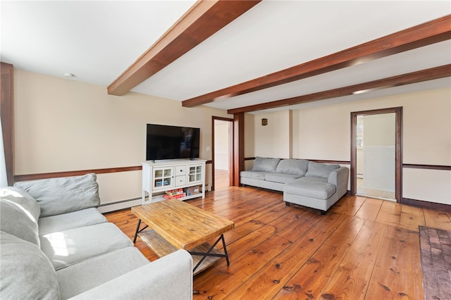 living area with hardwood / wood-style flooring, beamed ceiling, and a baseboard radiator