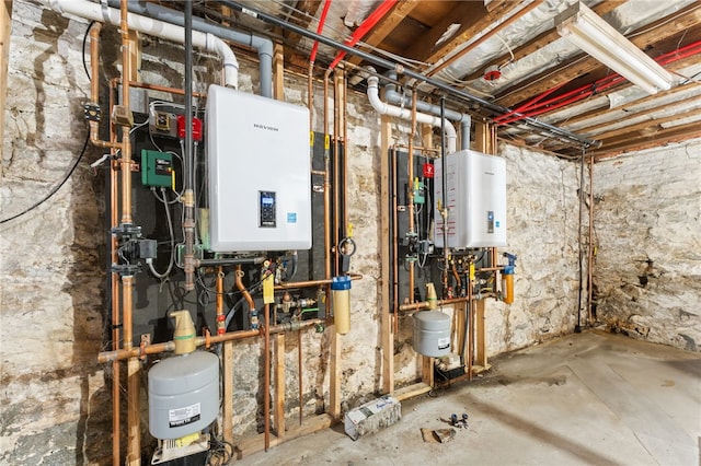 utility room featuring water heater