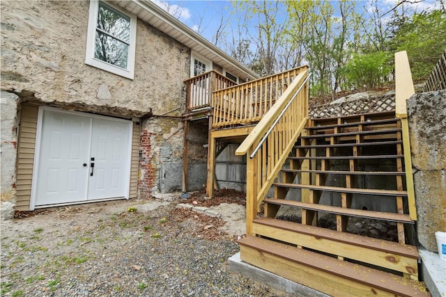 exterior space featuring a wooden deck and stairway