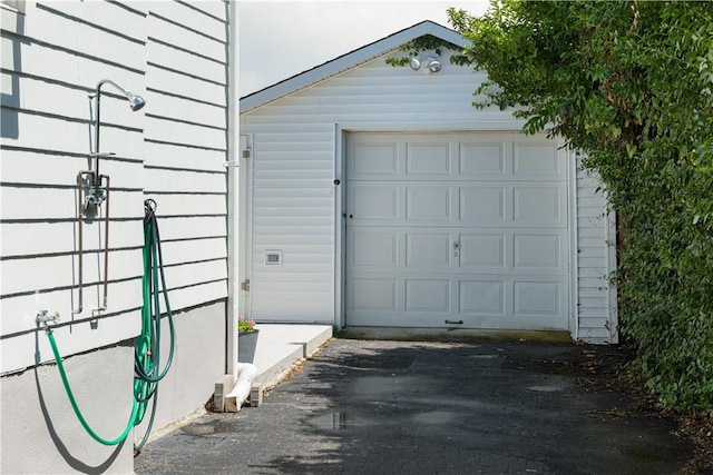 detached garage with driveway