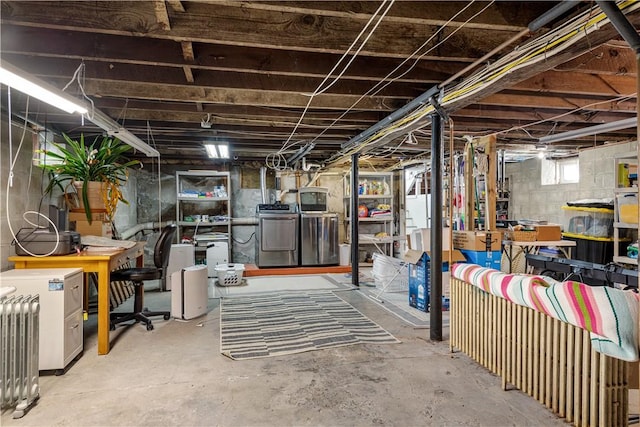 below grade area featuring washer / dryer