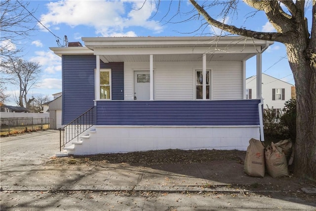 view of front of home featuring covered porch