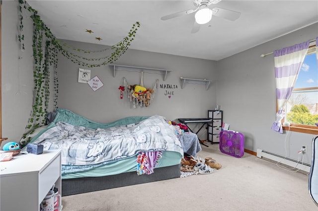 bedroom with a ceiling fan, carpet flooring, and a baseboard heating unit