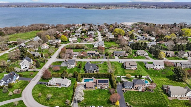 aerial view with a water view and a residential view