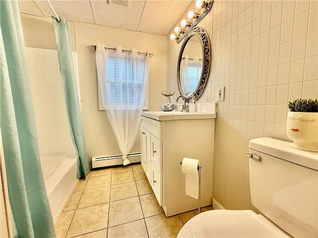 172 Park Ave, Woonsocket, RI 02895 - full bath with tile patterned floors, a baseboard radiator, vanity, and toilet