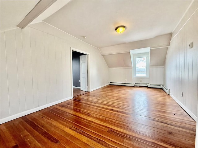 172 Park Ave, Woonsocket, RI 02895 - bonus room with vaulted ceiling with beams, baseboards, wooden walls, and hardwood / wood-style floors