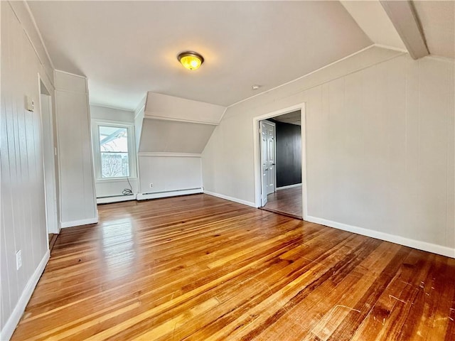 172 Park Ave, Woonsocket, RI 02895 - additional living space with baseboards, vaulted ceiling, and hardwood / wood-style flooring