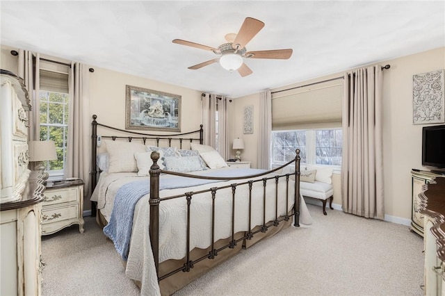 39 Greenbriar Rd, West Warwick, RI 02893 - bedroom with baseboards, light carpet, ceiling fan, and multiple windows