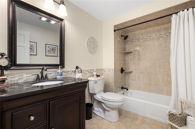 39 Greenbriar Rd, West Warwick, RI 02893 - full bath featuring vanity, shower / tub combo with curtain, toilet, tile patterned floors, and tile walls