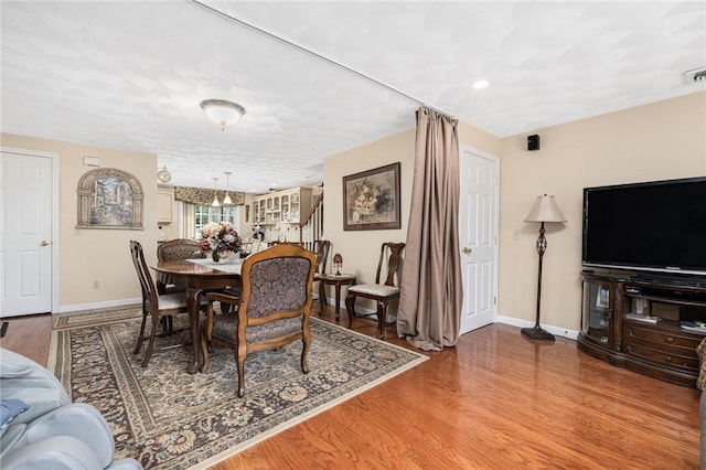 39 Greenbriar Rd, West Warwick, RI 02893 - dining room with baseboards, wood finished floors, a notable chandelier, and visible vents