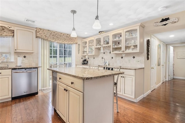 39 Greenbriar Rd, West Warwick, RI 02893 - kitchen featuring cream cabinets, visible vents, wood finished floors, and dishwasher