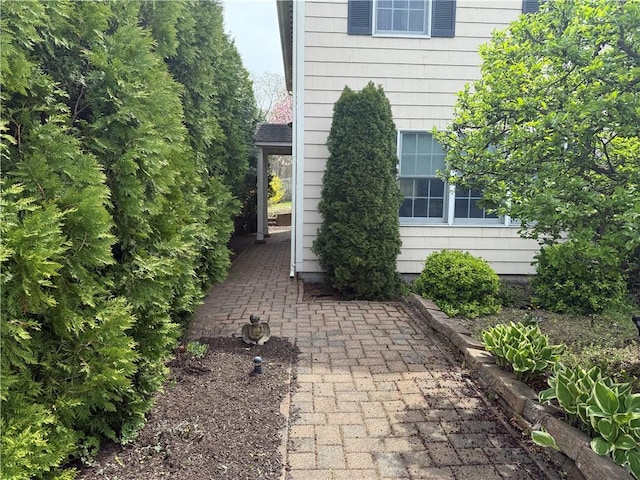39 Greenbriar Rd, West Warwick, RI 02893 - view of side of property featuring a patio area