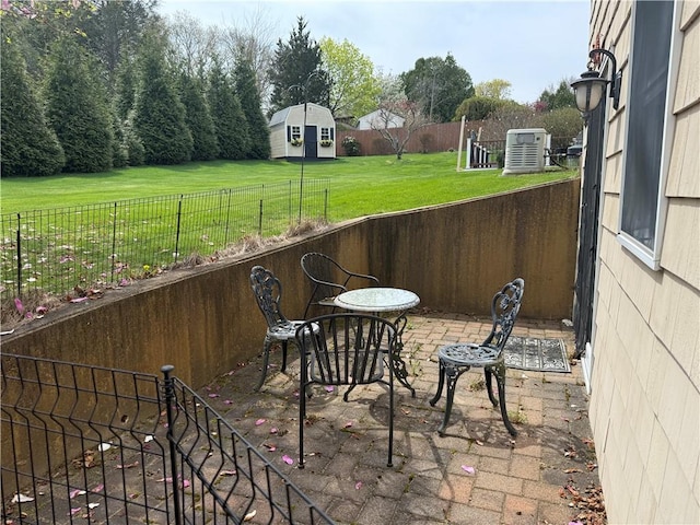 39 Greenbriar Rd, West Warwick, RI 02893 - view of patio featuring central air condition unit and fence