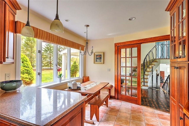 dining room with stairs, recessed lighting, and a chandelier
