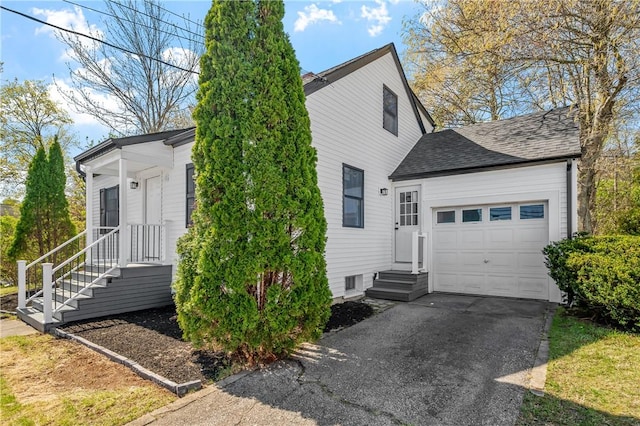 view of property exterior featuring concrete driveway, a garage, and a shingled roof