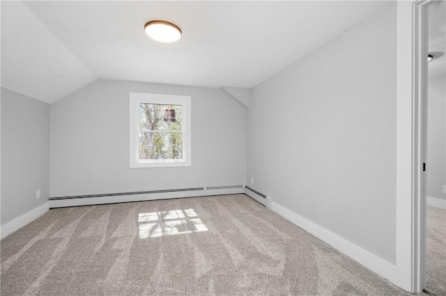 bonus room featuring carpet floors, baseboards, a baseboard heating unit, and lofted ceiling