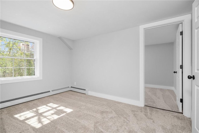 additional living space with carpet flooring and baseboards