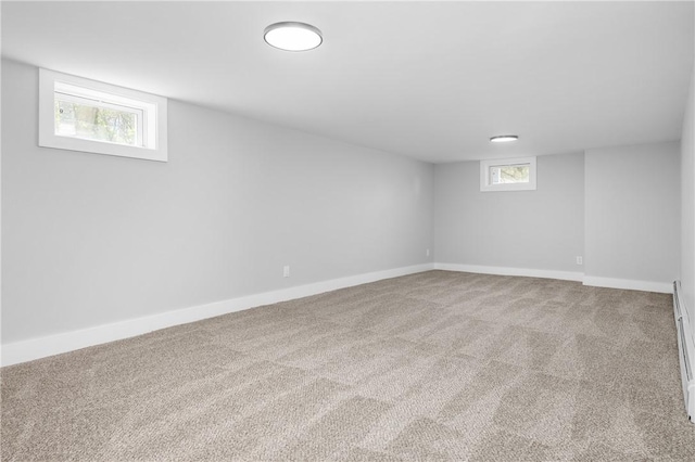 basement with carpet floors and baseboards