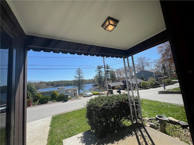 view of patio with a water view