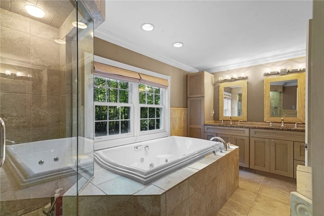full bath with a jetted tub, ornamental molding, recessed lighting, and vanity