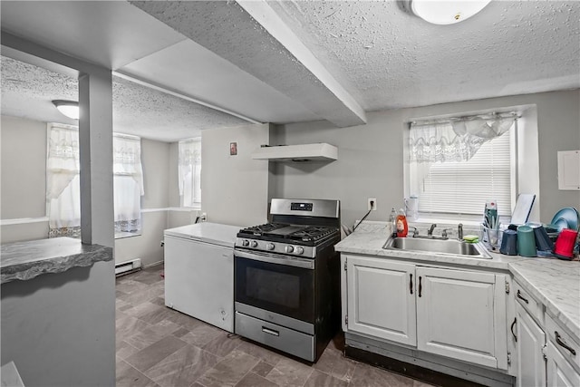 752 Social St, Woonsocket, RI 02895 - kitchen featuring a textured ceiling, gas range, baseboard heating, a sink, and under cabinet range hood