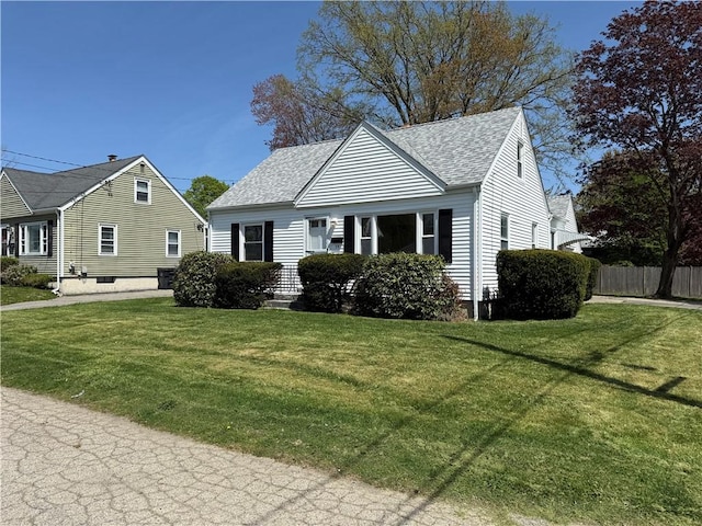 26 Yale Ave, East Providence, RI 02915 - bungalow featuring a front lawn, roof with shingles, and fence
