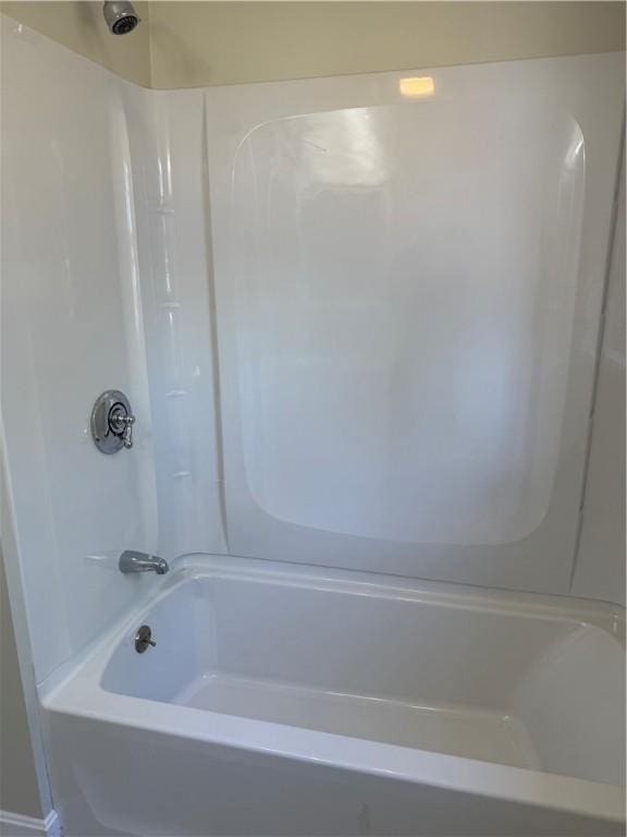bathroom with shower / bath combination