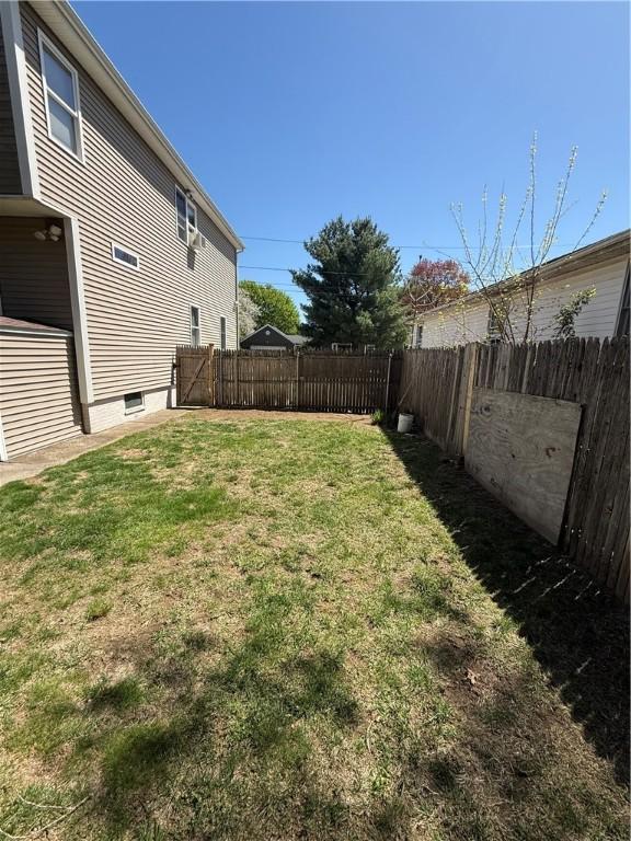 view of yard featuring a fenced backyard
