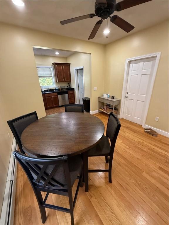 dining space with recessed lighting, baseboards, ceiling fan, and light wood finished floors
