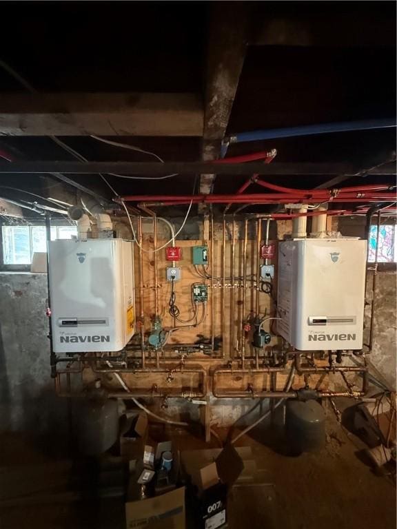 utility room featuring water heater