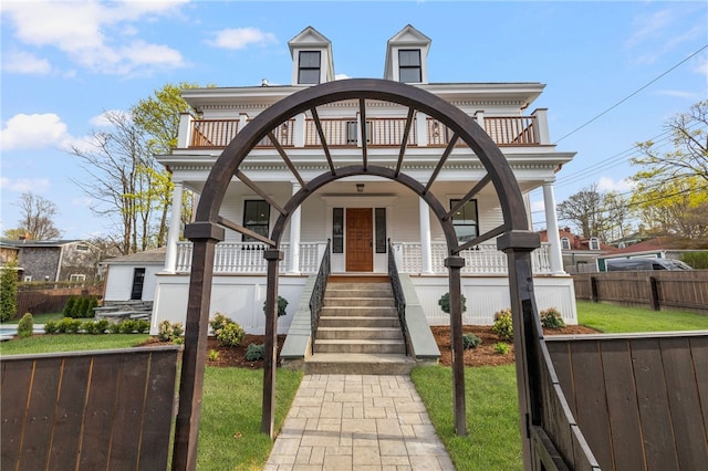 7 Champlin St, Newport, RI 02840 - view of front of home with fence and covered porch