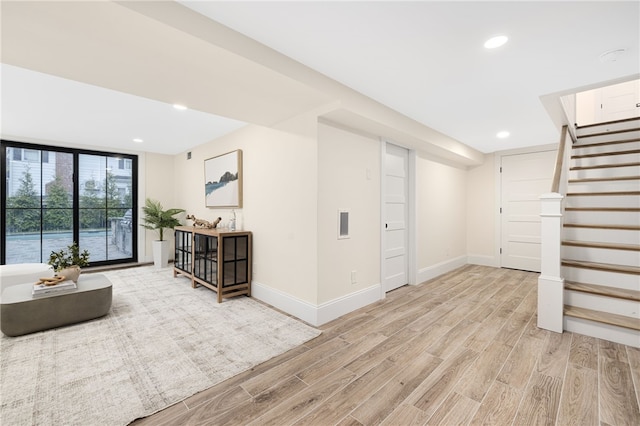 7 Champlin St, Newport, RI 02840 - below grade area featuring recessed lighting, baseboards, stairway, and light wood-type flooring